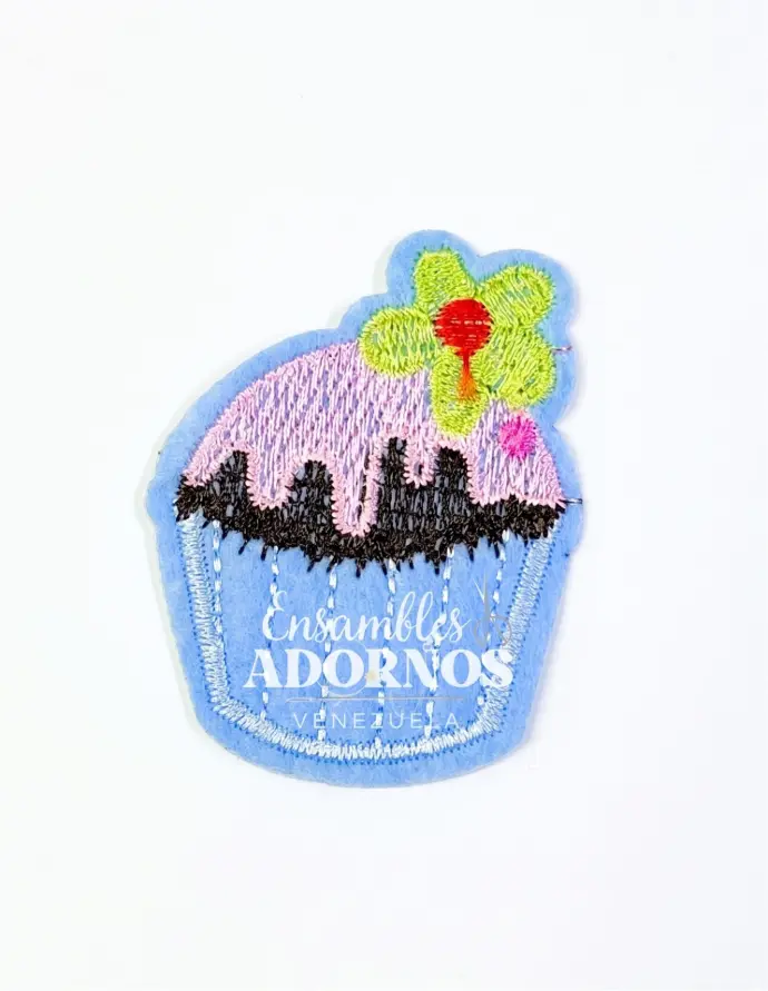 APLICACION CON PEGA PONQUE AZUL CON VERD 4.6CMX6.1CM (PQT X 20 UND)