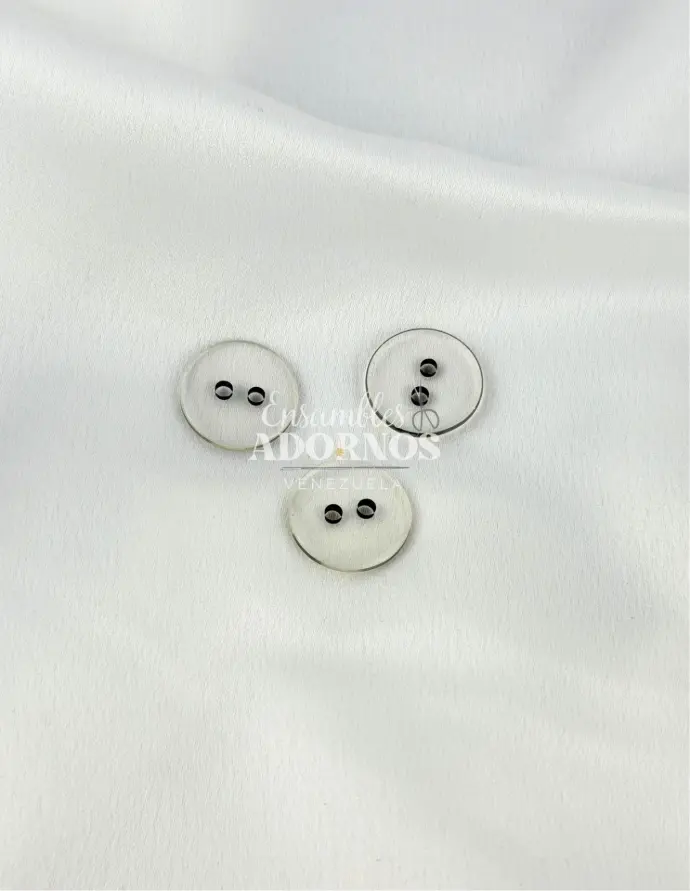 BOTON TENTACION OJO NEGRO 2 HUECOS 24L (PAQUETE X 500UNID)