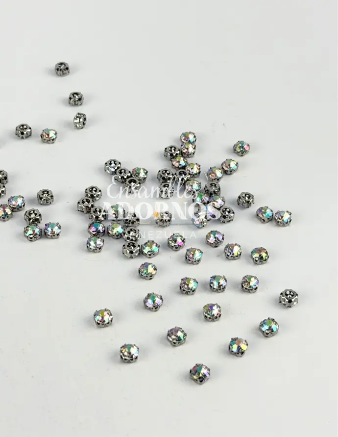 PIEDRA HILO ZIRCON 6MM CON TACHE (PQT 1000 UND + 50 GRS TACHE)