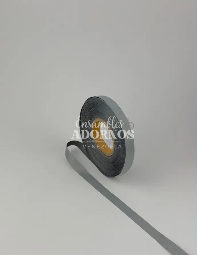 CINTA REFLECTIVA TELA GRIS AAA 1.3 CM (ROLLO X 100 MTS)