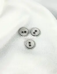 BOTON TENTACION OJO NEGRO 2 HUECOS 20L (PAQUETE X 1000UNID)